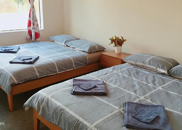 4 Beds Including 2 Double Beds, 1 Single Bed, And 1 Double Sofa Bed In A Small 1 Bedroom And 1 Lounge No Kitchen Only Fridge, Microwave 3*